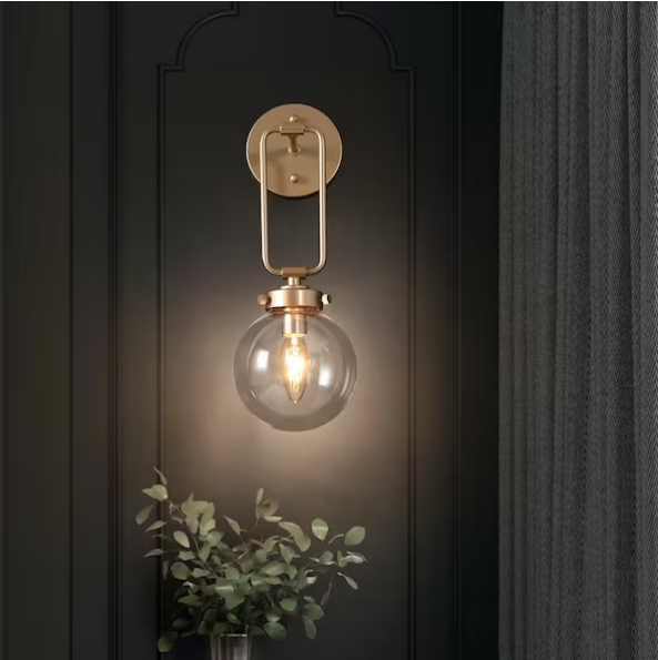 1-Light Antique Gold Globe Wall Sconce with Clear Glass – Naomi Collection